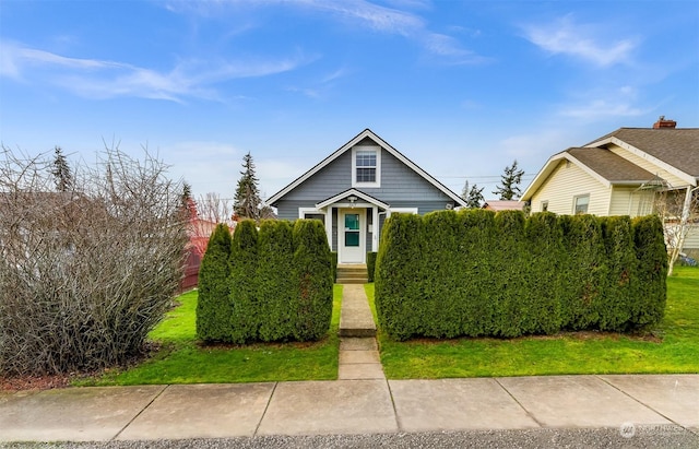 view of front of house with a front lawn