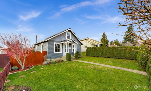 view of front of home with a front lawn