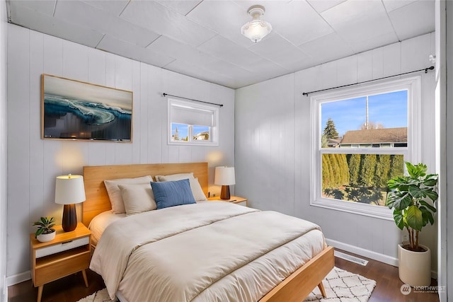 bedroom featuring dark hardwood / wood-style floors