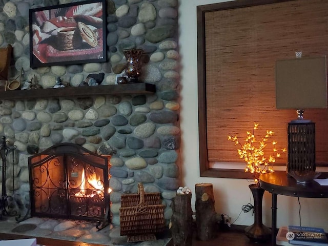 interior details with a fireplace and wood walls