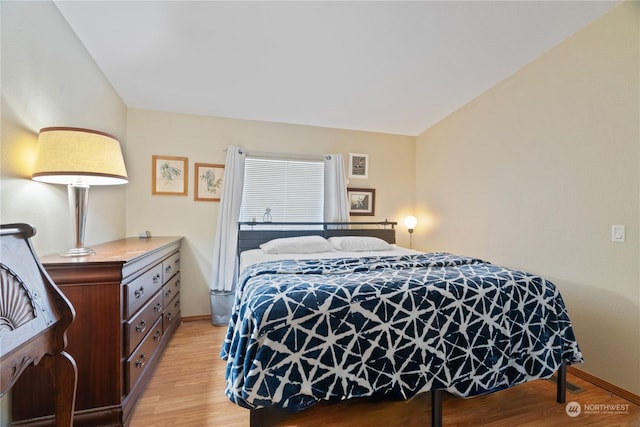 bedroom with light hardwood / wood-style flooring