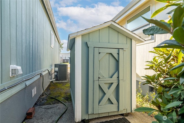 view of outbuilding featuring cooling unit