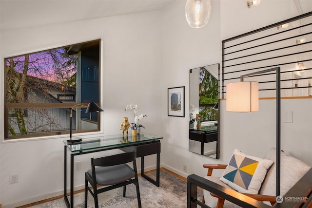 office area with hardwood / wood-style floors