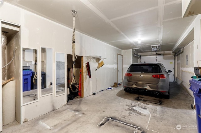 garage featuring a garage door opener