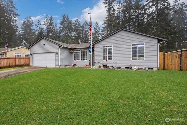 single story home featuring a garage and a front lawn