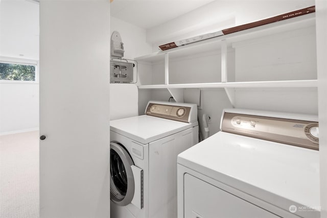 laundry room featuring washer and clothes dryer