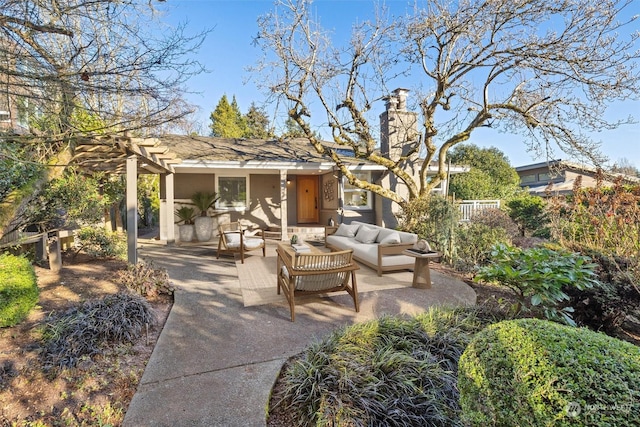 exterior space featuring a patio, outdoor lounge area, and a pergola