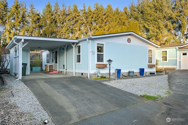 manufactured / mobile home with a carport