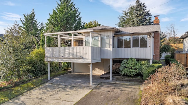 view of front of property with a carport