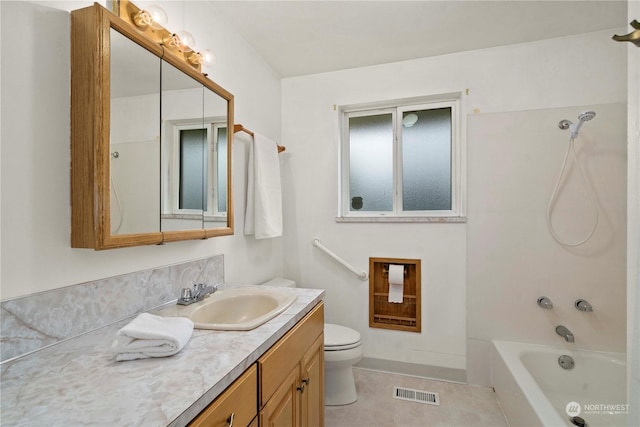 full bathroom with toilet, vanity, bathing tub / shower combination, and tile patterned floors