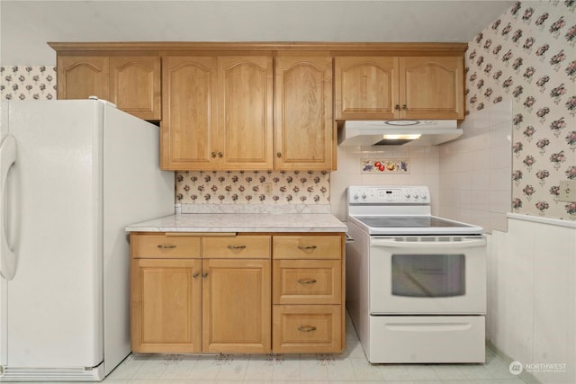 kitchen featuring white appliances