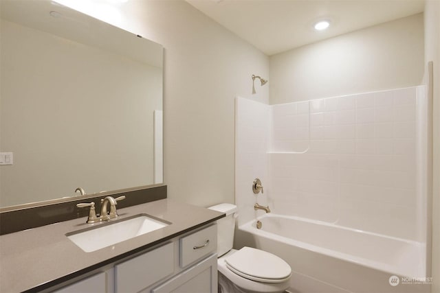 full bathroom featuring vanity, shower / washtub combination, and toilet