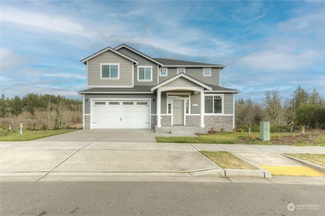 craftsman inspired home with a garage