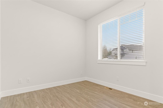 empty room featuring light wood-type flooring