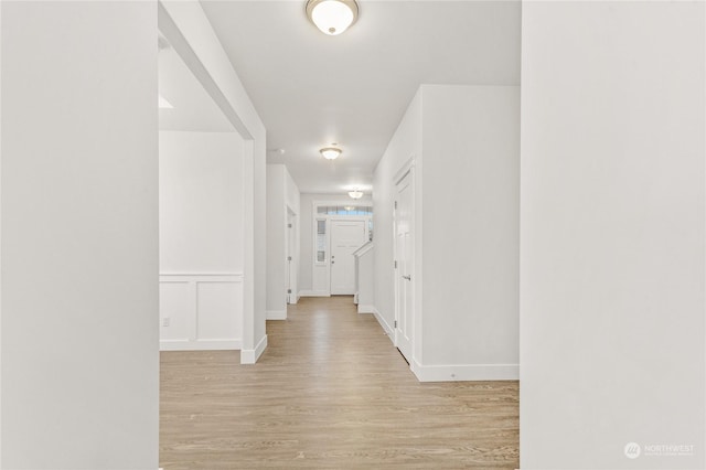 hallway featuring light hardwood / wood-style flooring