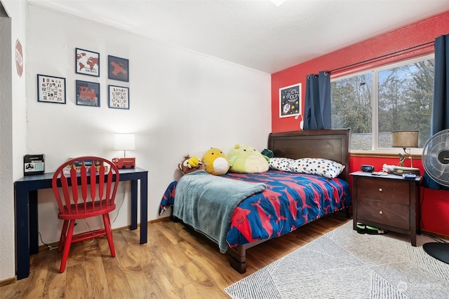 bedroom featuring light hardwood / wood-style floors