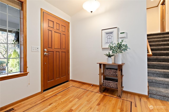 foyer with hardwood / wood-style floors