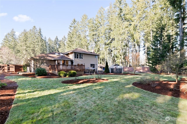 view of yard with a deck