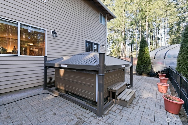 view of patio with an outdoor structure