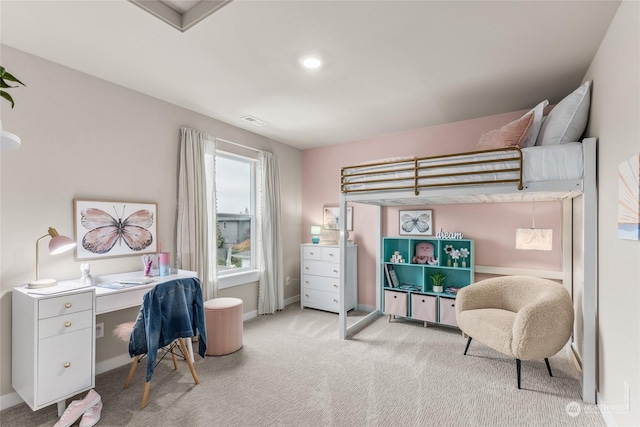 bedroom with light colored carpet