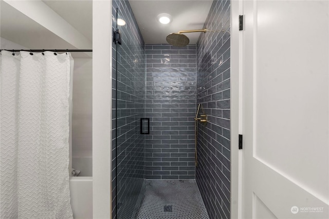 bathroom featuring walk in shower