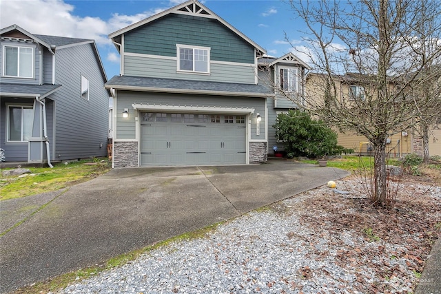 view of front of property featuring a garage