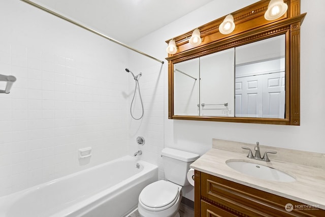 full bathroom featuring vanity, tub / shower combination, and toilet