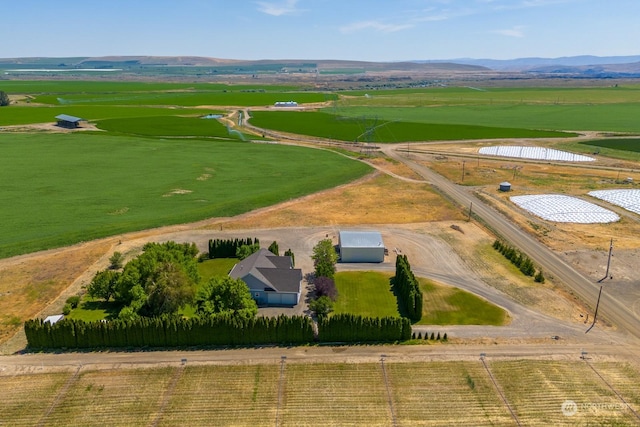 aerial view featuring a mountain view and a rural view