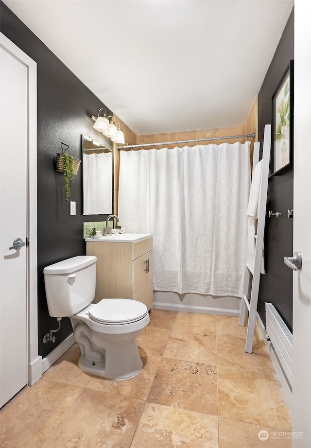 full bathroom with toilet, vanity, and shower / tub combo with curtain