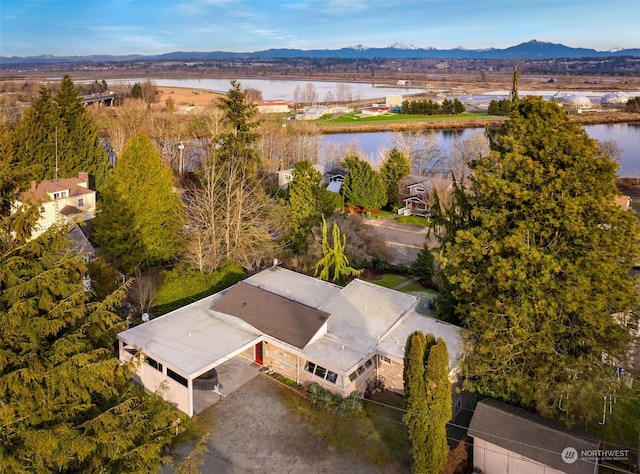 bird's eye view with a water and mountain view