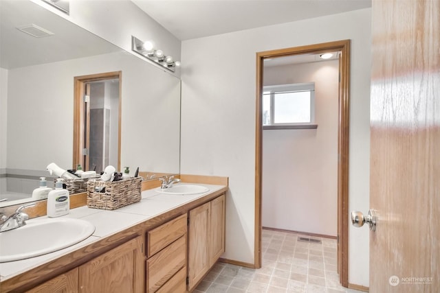 bathroom featuring vanity