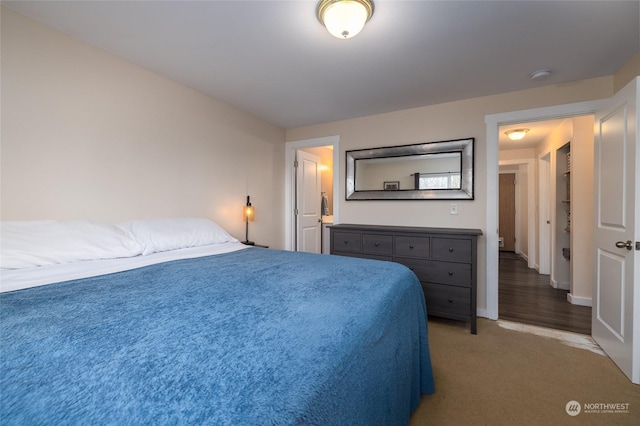 bedroom featuring light carpet