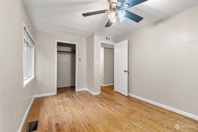 unfurnished bedroom featuring a closet, ceiling fan, and light hardwood / wood-style floors