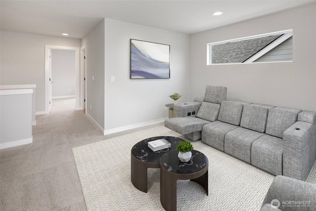 living area featuring recessed lighting, baseboards, and light colored carpet