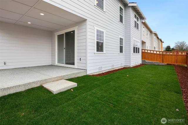 view of yard featuring a patio area and fence