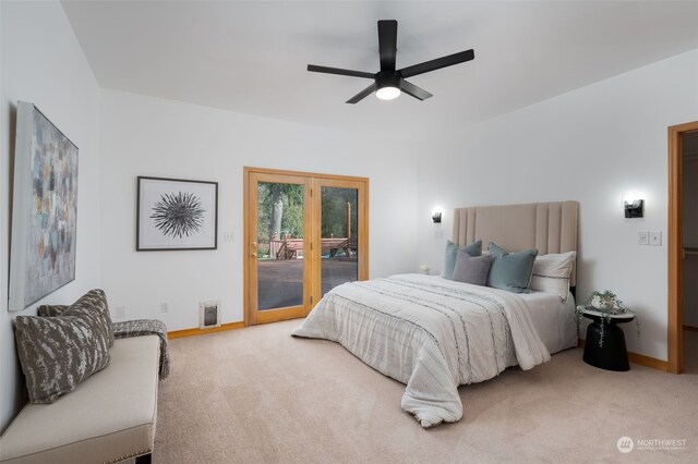 carpeted bedroom featuring ceiling fan and access to exterior