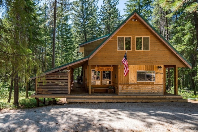 cabin featuring a porch