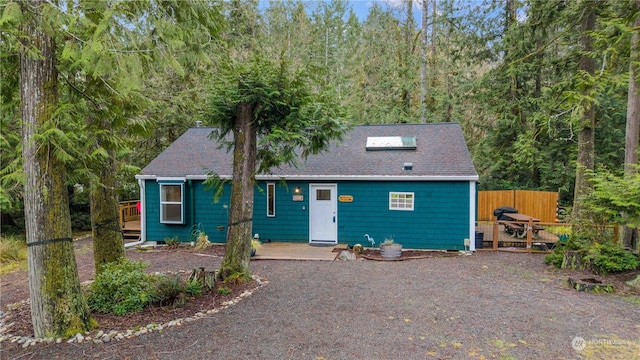 view of front of house with a wooden deck