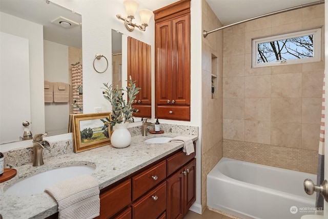 bathroom featuring shower / bathtub combination with curtain and vanity