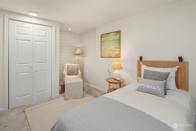 carpeted bedroom with a closet