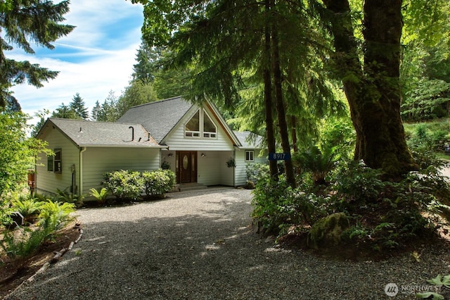 8917 SE Mcbreen Ln, Port Orchard, WA 98367 - rustic home with gravel driveway and a shingled roof