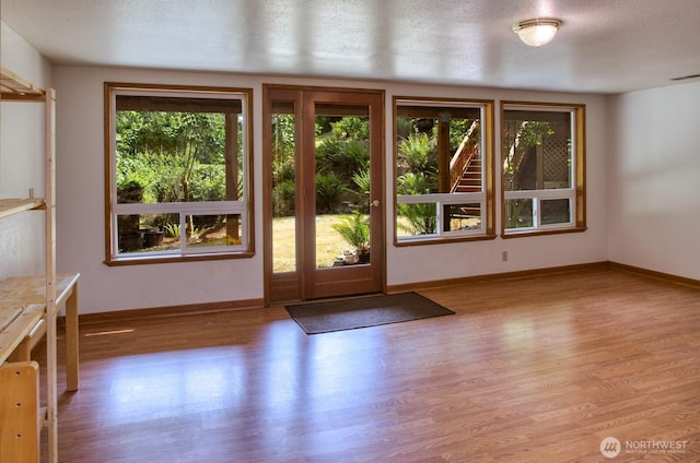 8917 SE Mcbreen Ln, Port Orchard, WA 98367 - entryway with wood finished floors and a textured ceiling