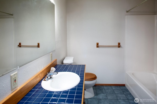 8917 SE Mcbreen Ln, Port Orchard, WA 98367 - full bath with tile patterned floors and shower / washtub combination