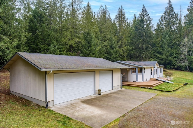 view of front of house with a deck and a front lawn