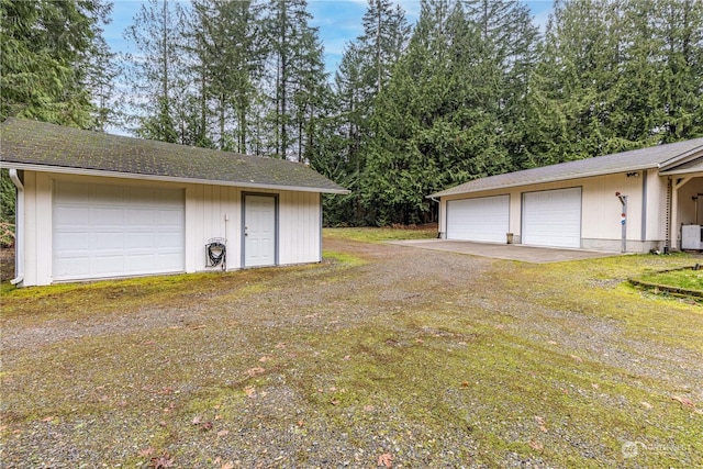 garage with a lawn