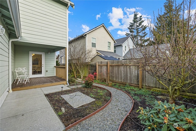 view of yard with a wooden deck