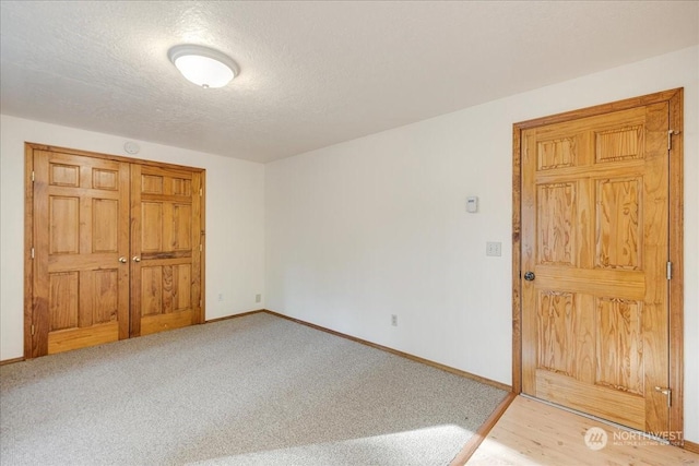 interior space with a textured ceiling