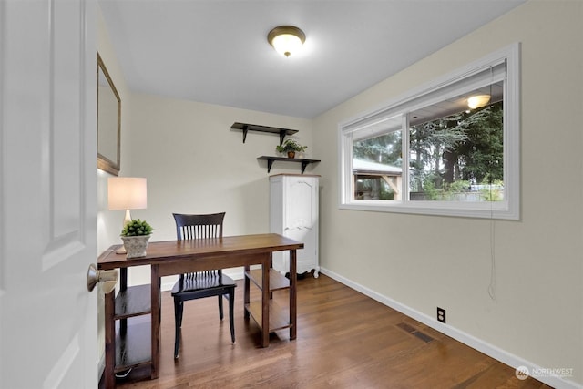 office area with dark wood-type flooring