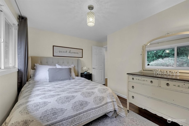 bedroom featuring wood-type flooring