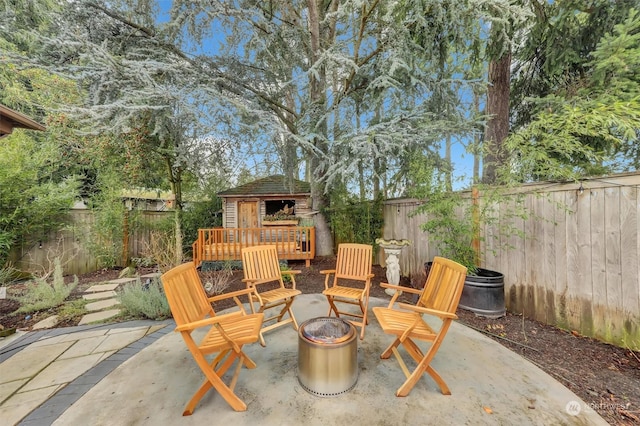 view of patio / terrace with a fire pit